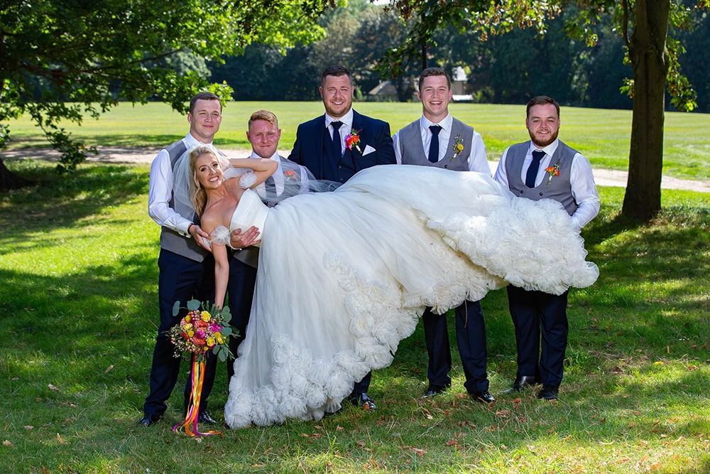 Bridge is being held by a groom and his four friends